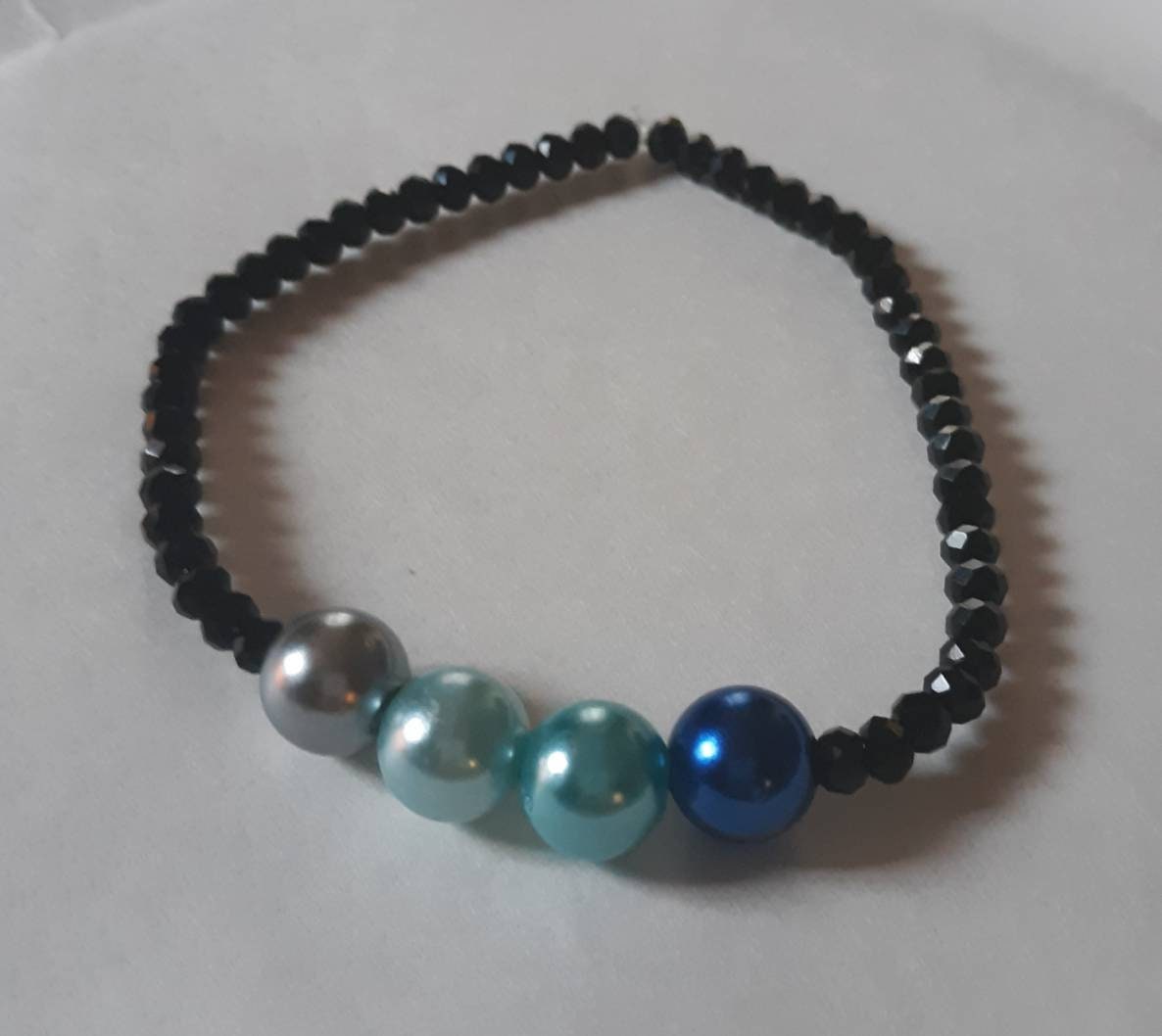 Faux Pearl and Sparkly Black Bracelets